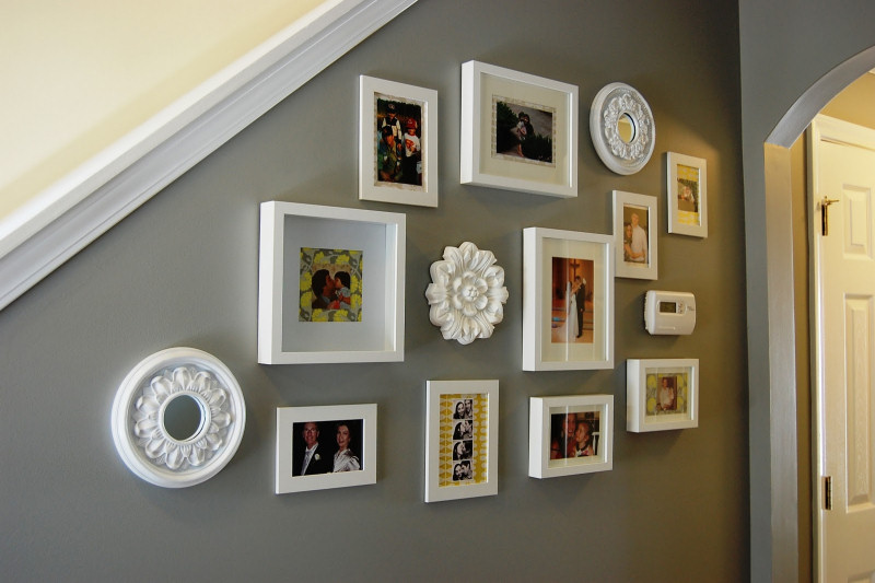 Instead of covering that ugly old thermostat, get creative with your wall decor to conceal and beautify it!